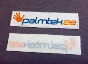 Embleem valge kangast alusega