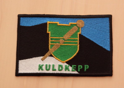 Tikitud embleem Kuldkepp