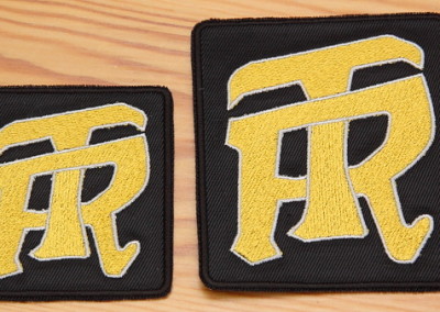 Tikitud embleem TR